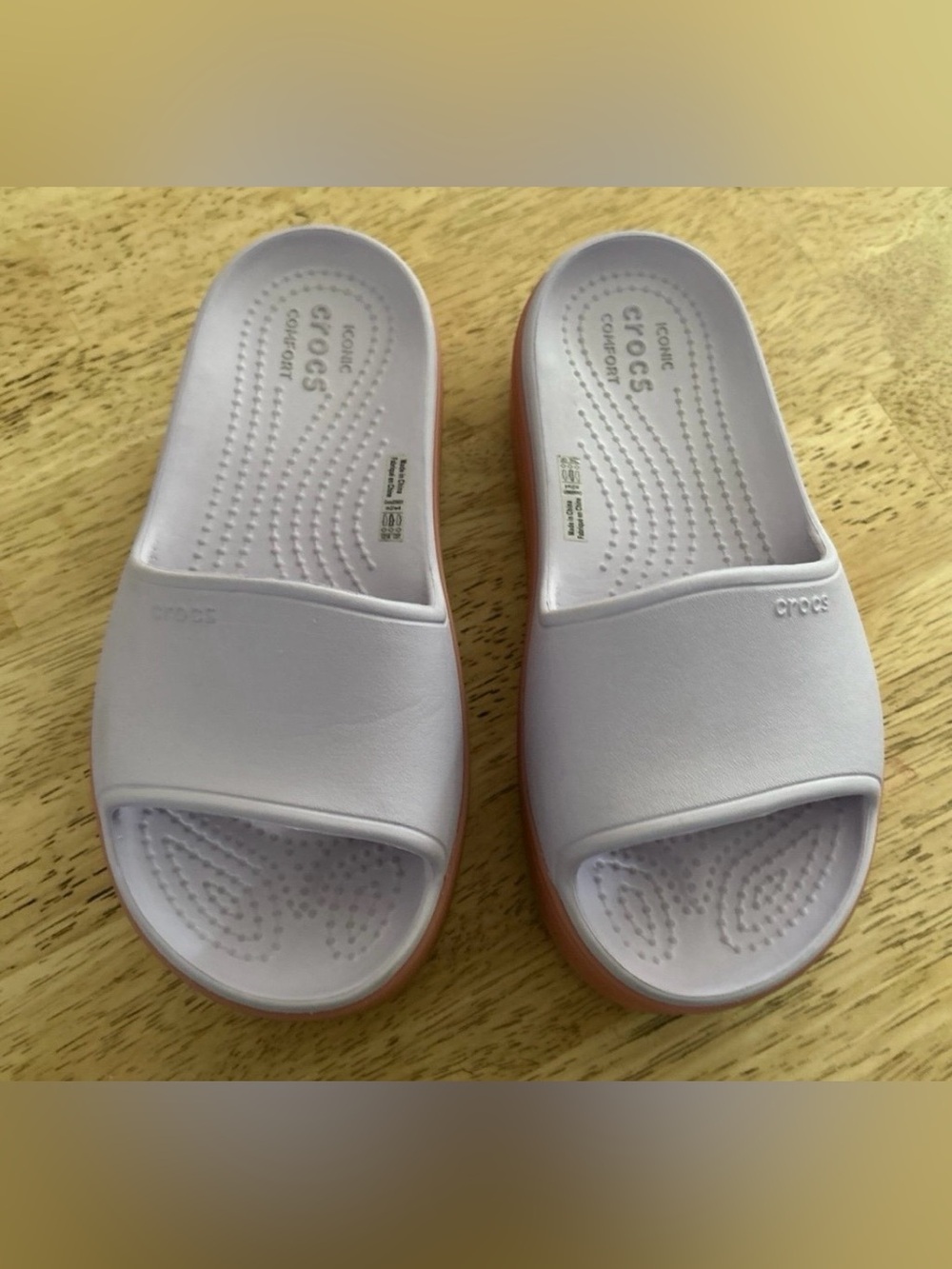 Crocs LiteRide Slide Platform Sandals in Light Lavender with Peach Sole.